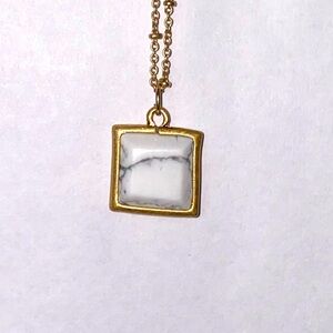 White Marbled stone pendant on gold chain